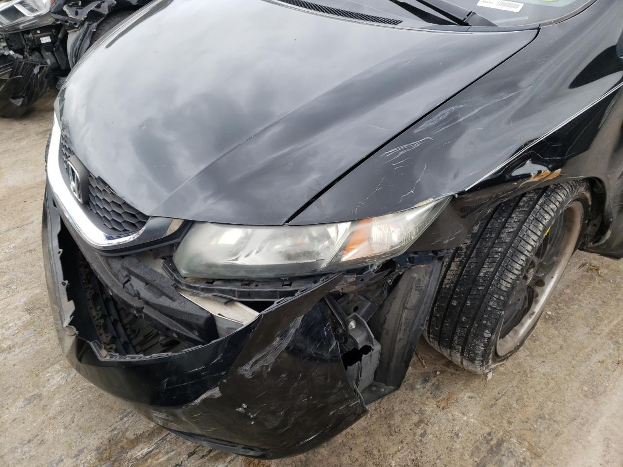 Photo 9 from auction – 2014 HONDA CIVIC LX with VIN 2HGFB2F58EH527744