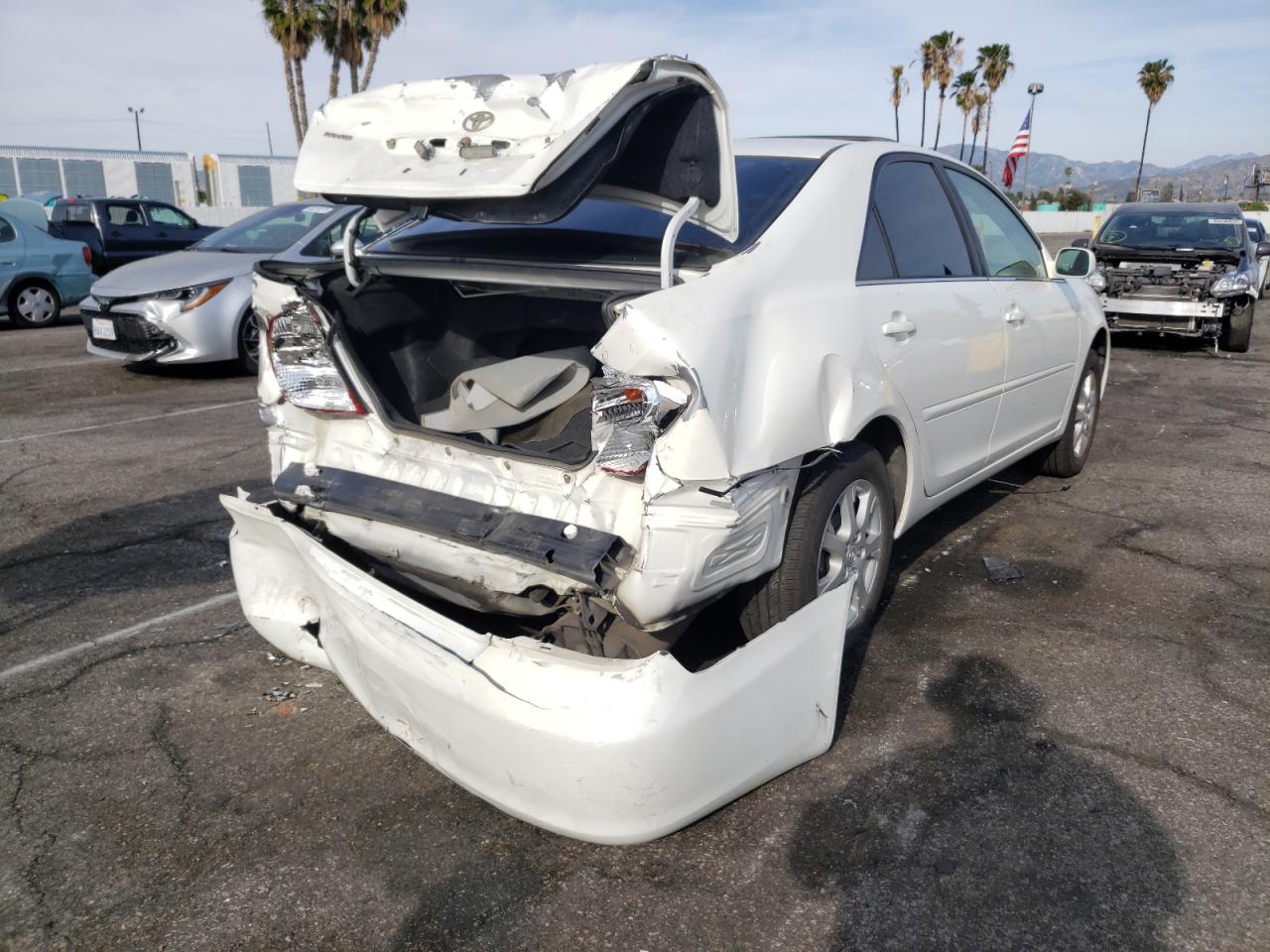 Photo 4 from auction – 2004 TOYOTA CAMRY LE with VIN JTDBE32KX40263306