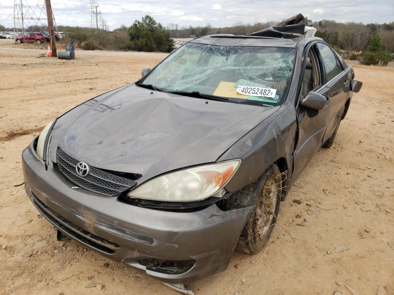 Photo 2 from auction – 2004 TOYOTA CAMRY LE with VIN 4T1BF30K24U573292