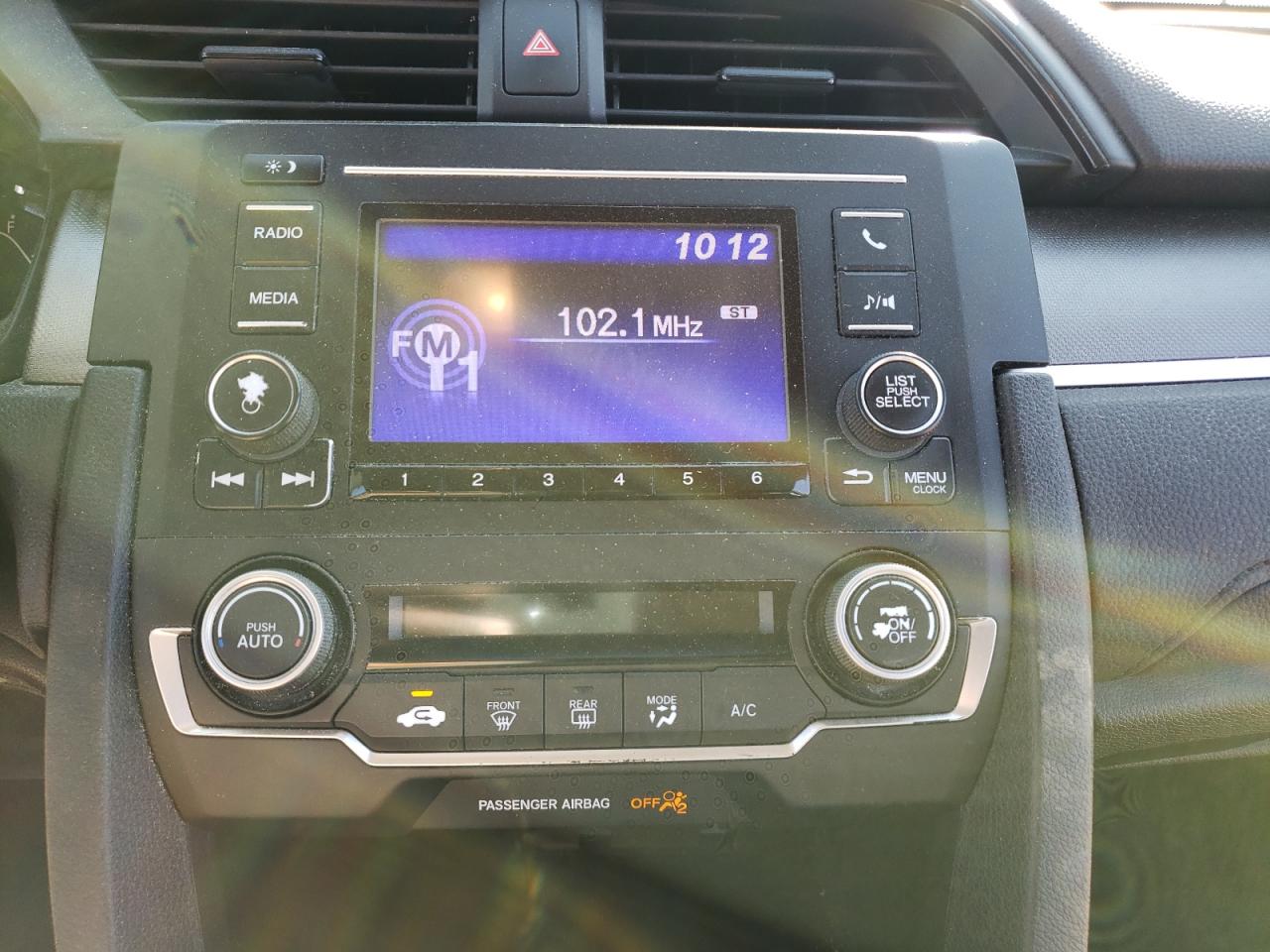 Photo 9 from auction – 2018 HONDA CIVIC LX with VIN 2HGFC2F57JH596688