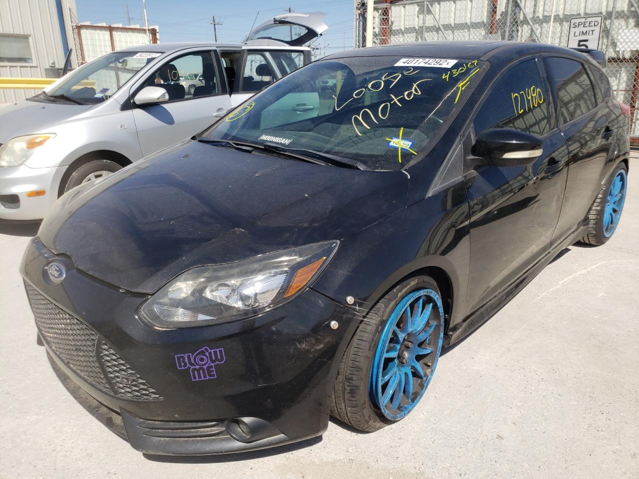 Photo 2 from auction – 2014 FORD FOCUS ST with VIN 1FADP3L98EL430167