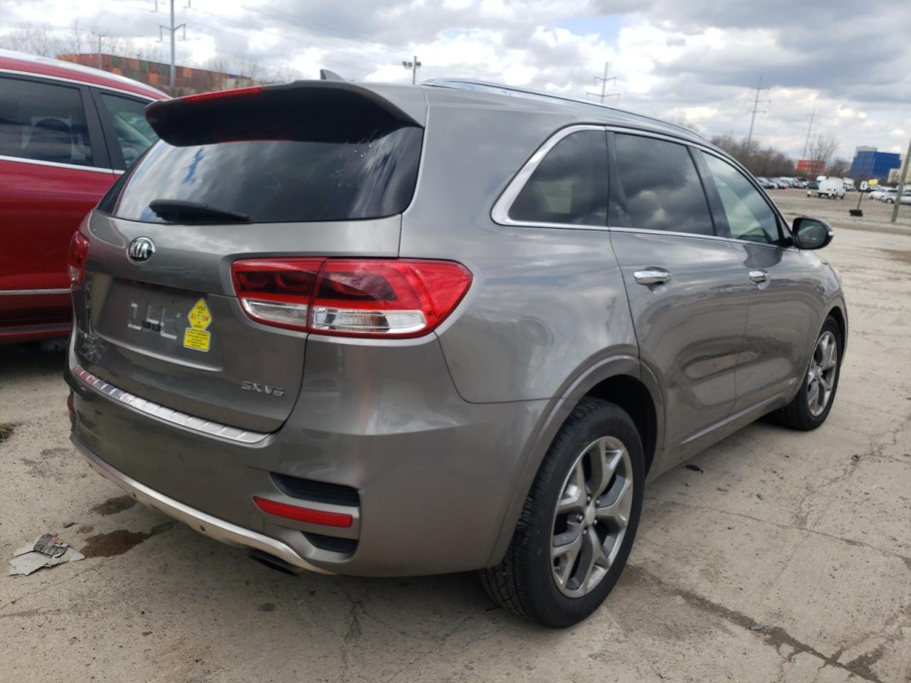 Photo 4 from auction – 2016 KIA SORENTO SX with VIN 5XYPKDA56GG020753