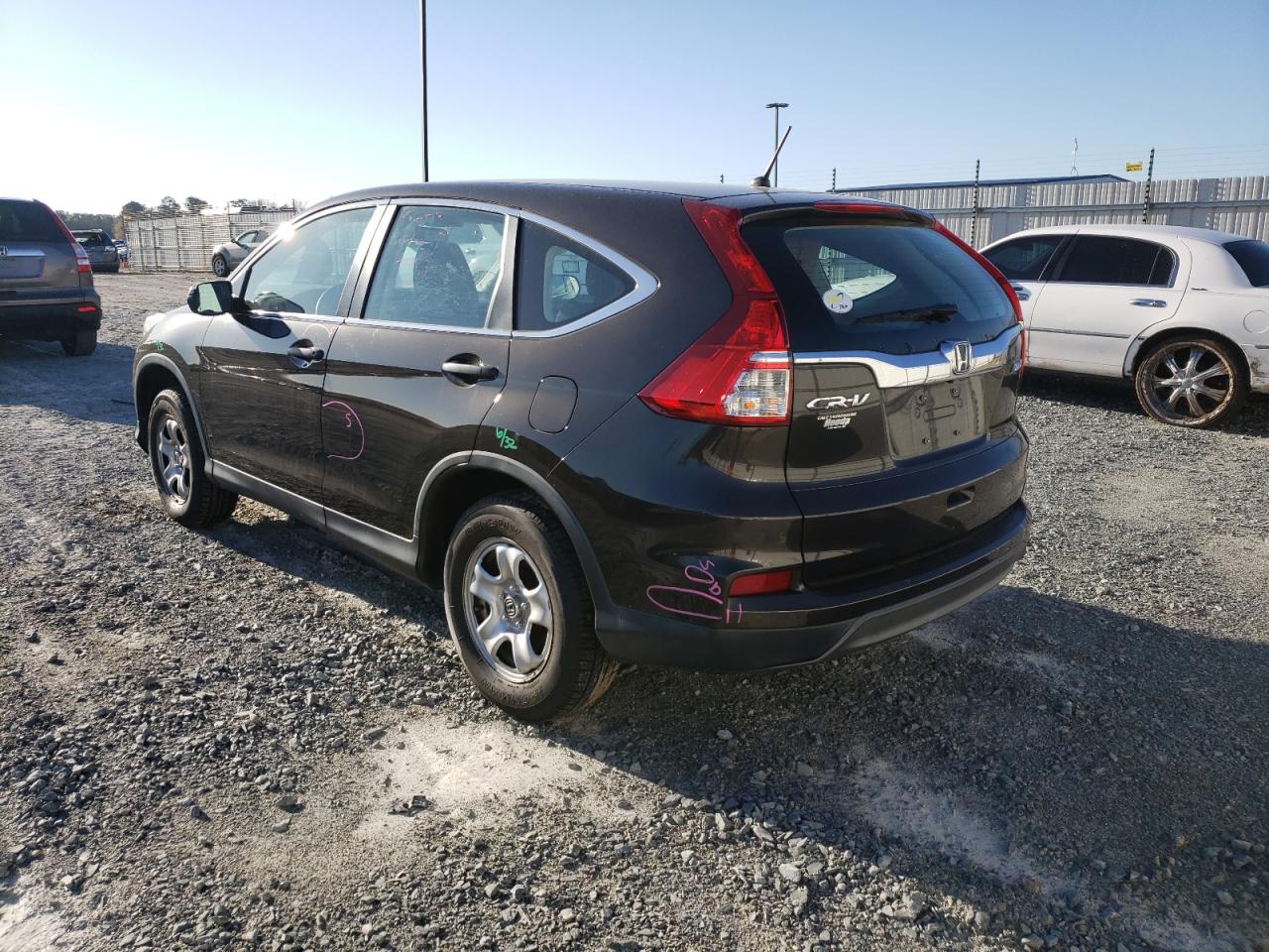 Photo 3 from auction – 2015 HONDA CR-V LX with VIN 5J6RM4H39FL013087