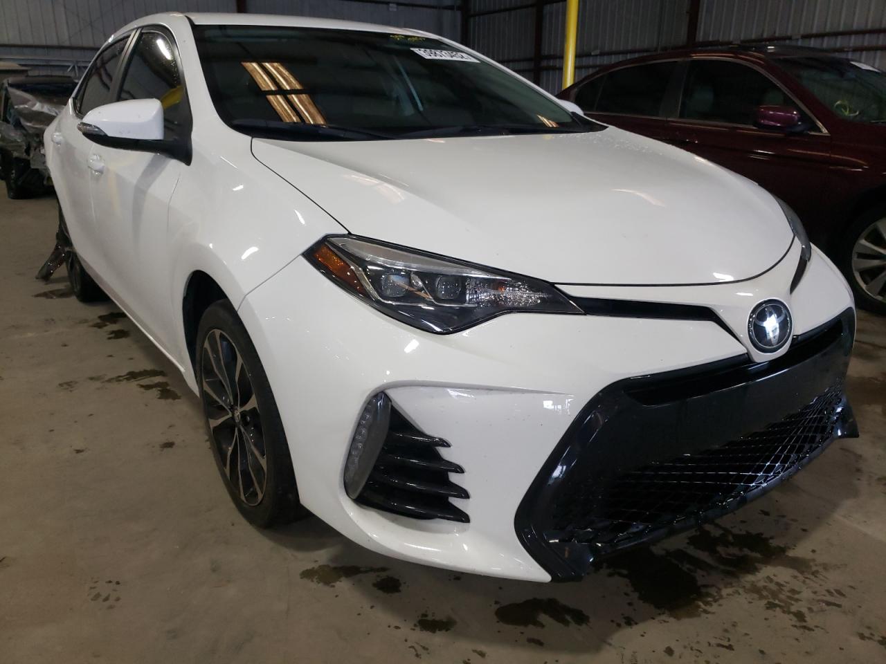 TOYOTA COROLLA L 2019 with VIN 5YFBURHE7KP879264 - Photo from auction