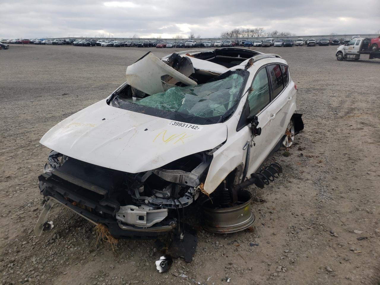 Photo 9 from auction – 2014 FORD ESCAPE TIT with VIN 1FMCU9J99EUD60057