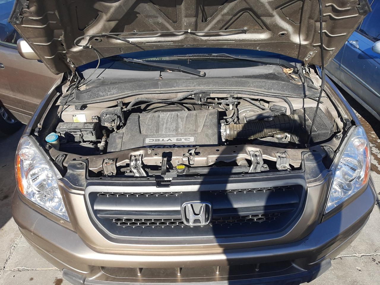 Photo 7 from auction – 2005 HONDA PILOT EX with VIN 5FNYF18495B010386