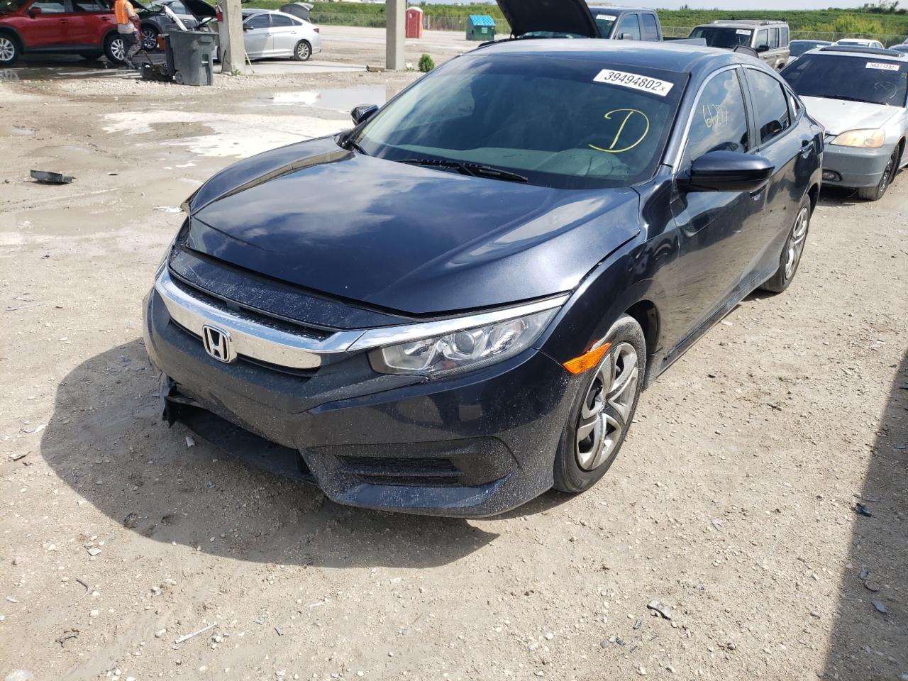 Photo 2 from auction – 2018 HONDA CIVIC LX with VIN 2HGFC2F56JH539009
