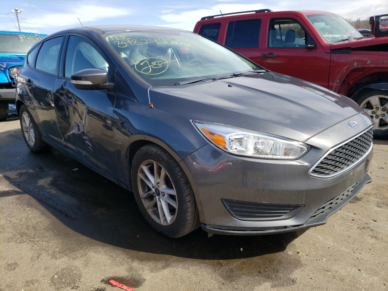 FORD FOCUS SE 2017 with VIN 1FADP3K23HL290974 - Photo from auction