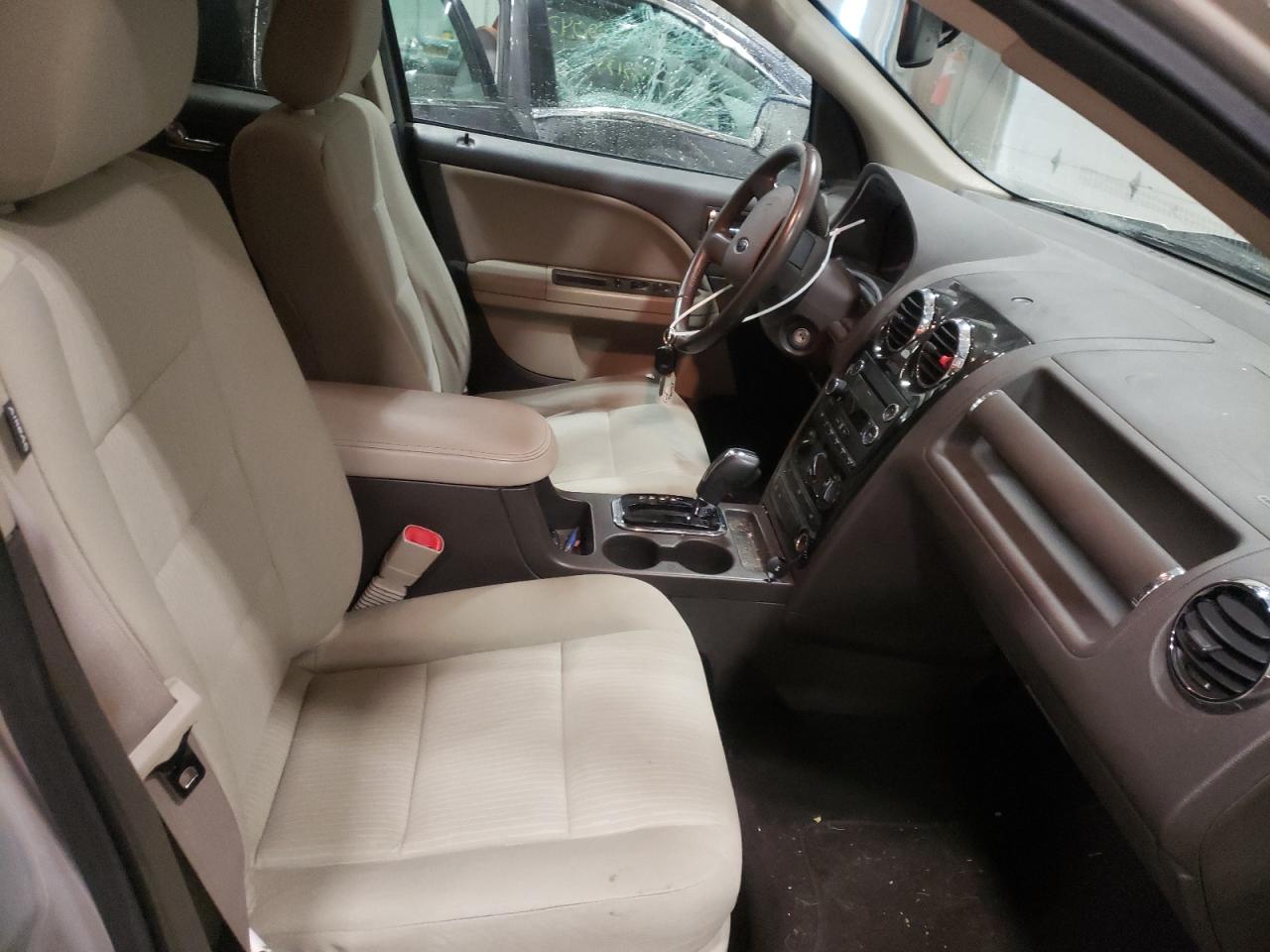 Photo 5 from auction – 2009 FORD TAURUS X S with VIN 1FMDK02W79GA06312
