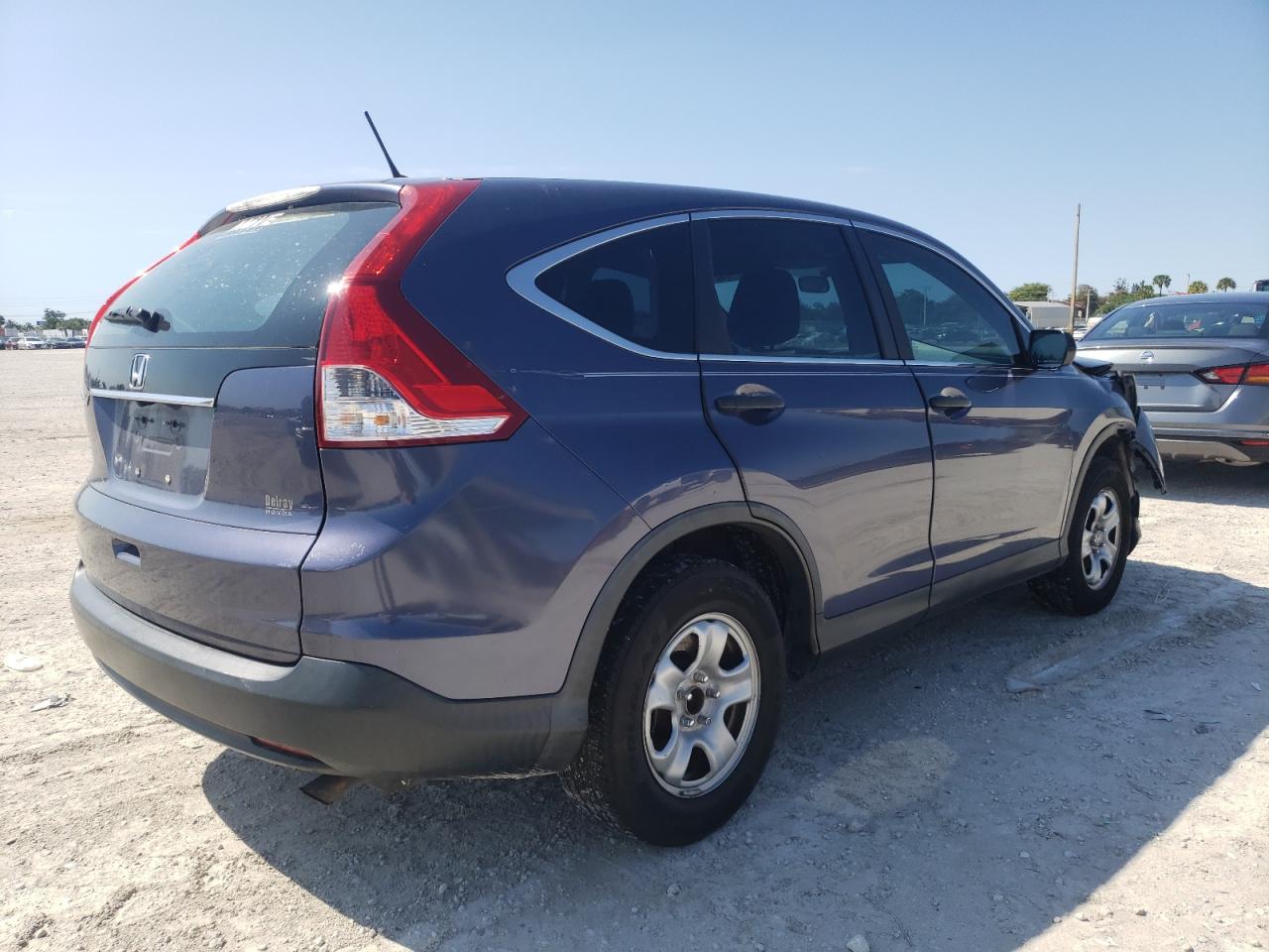 Photo 4 from auction – 2012 HONDA CR-V LX with VIN 3CZRM3H3XCG700744
