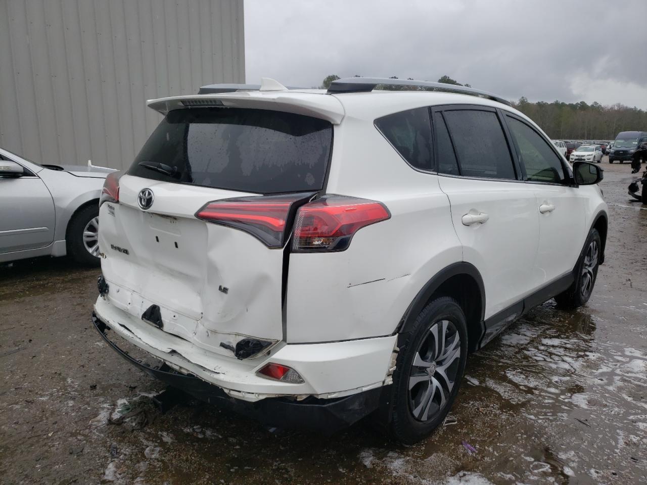 Photo 4 from auction – 2017 TOYOTA RAV4 LE with VIN JTMZFREV3HJ110271