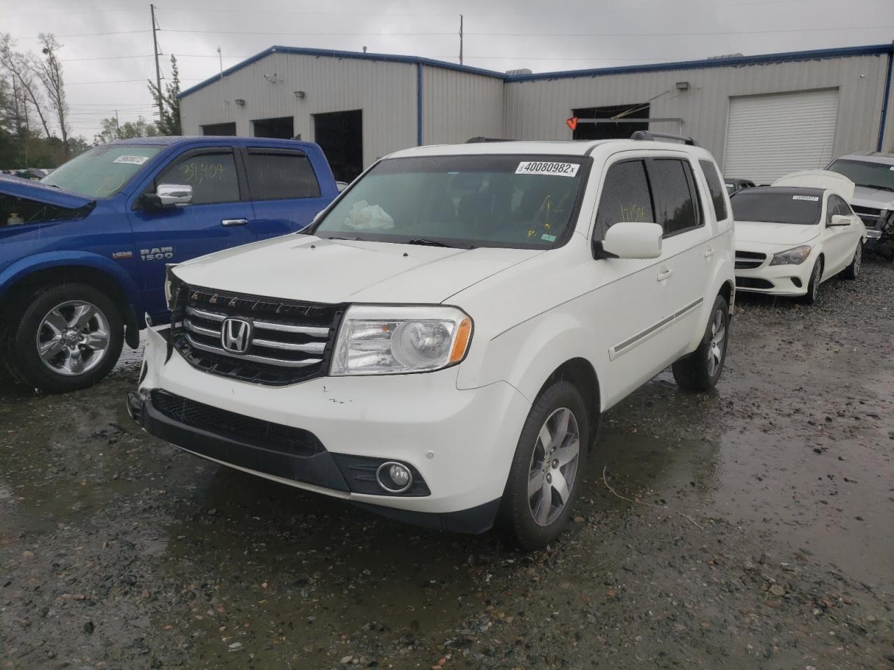 Photo 2 from auction – 2012 HONDA PILOT TOUR with VIN 5FNYF3H92CB042049