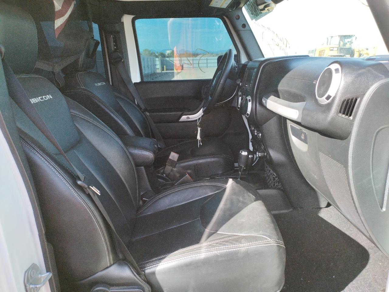 Photo 5 from auction – 2016 JEEP WRANGLER U with VIN 1C4HJWFG9GL180076