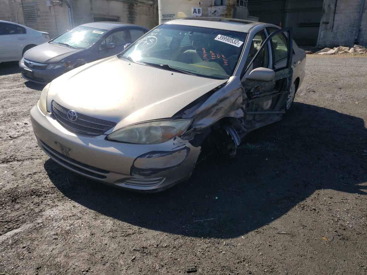 Photo 2 from auction – 2002 TOYOTA CAMRY LE with VIN 4T1BE30K82U620499