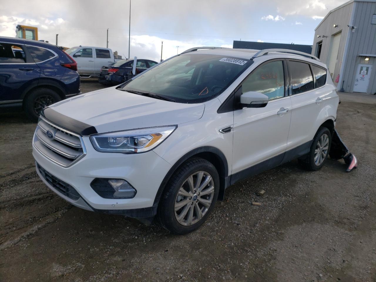 Photo 2 from auction – 2018 FORD ESCAPE TIT with VIN 1FMCU9J94JUB89048