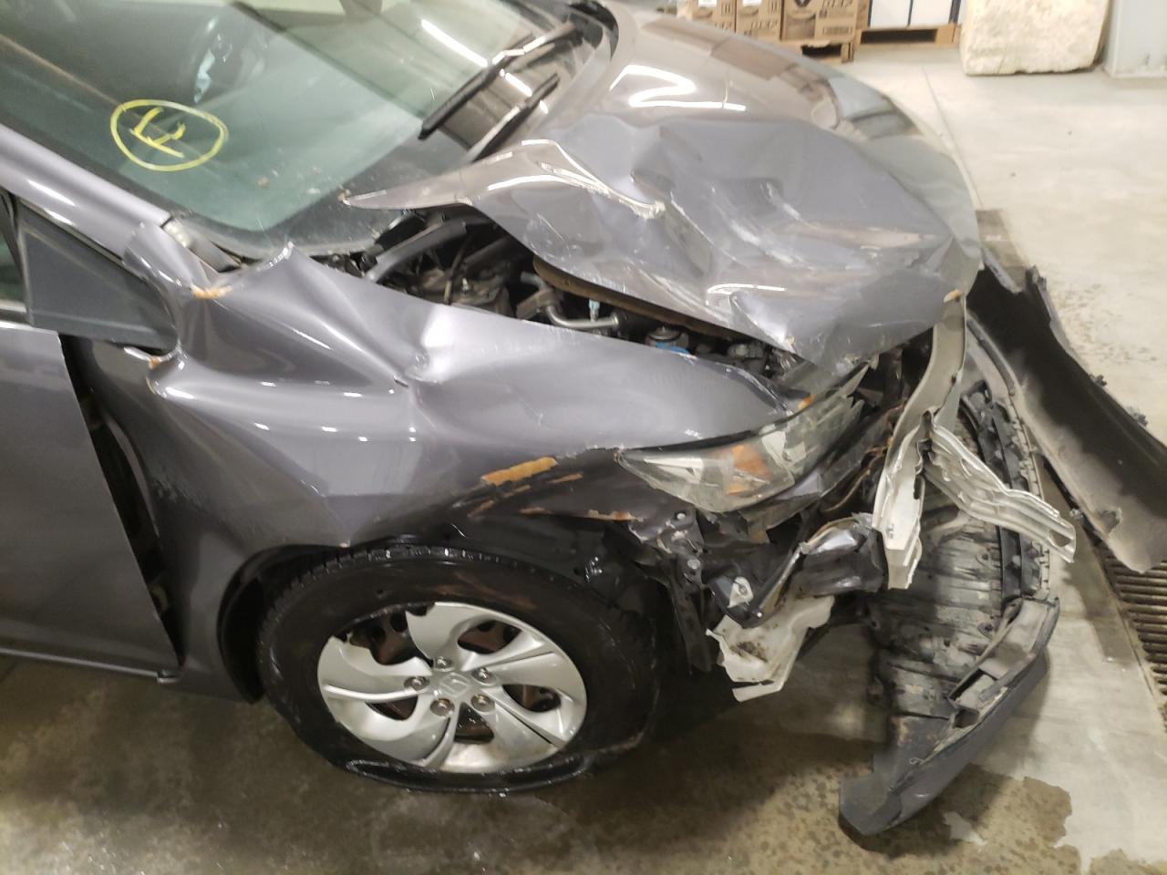 Photo 9 from auction – 2015 HONDA CIVIC LX with VIN 2HGFB2F53FH513526