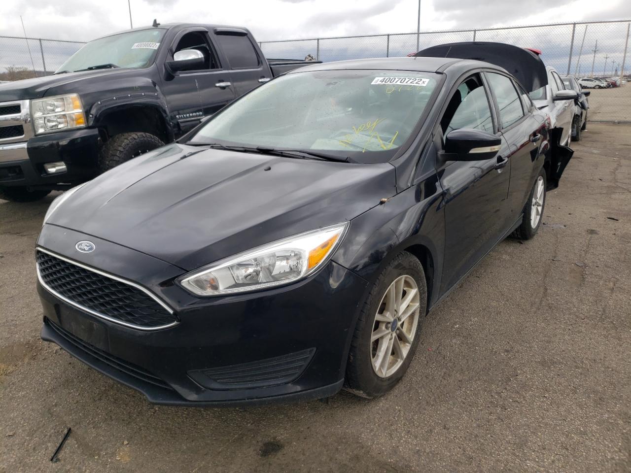 Photo 2 from auction – 2016 FORD FOCUS SE with VIN 1FADP3F20GL251946