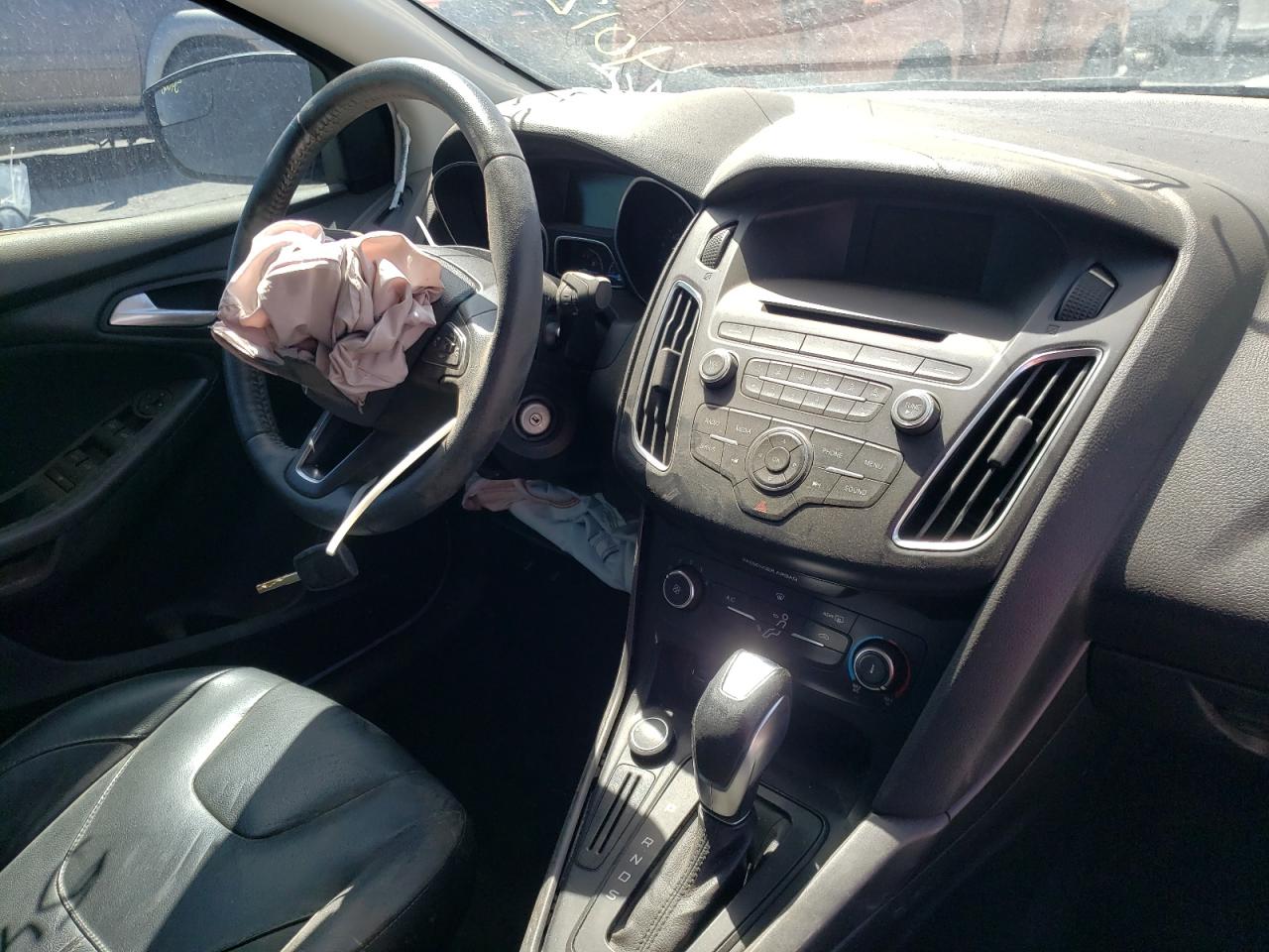 Photo 9 from auction – 2015 FORD FOCUS SE with VIN 1FADP3F25FL364015