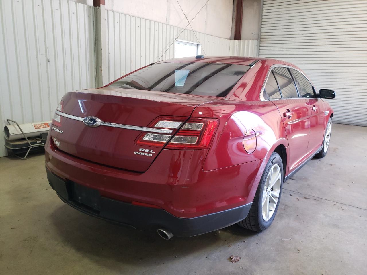 Photo 4 from auction – 2015 FORD TAURUS SEL with VIN 1FAHP2E85FG115269
