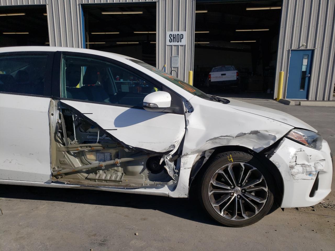 Photo 9 from auction – 2015 TOYOTA COROLLA L with VIN 5YFBURHE1FP185398
