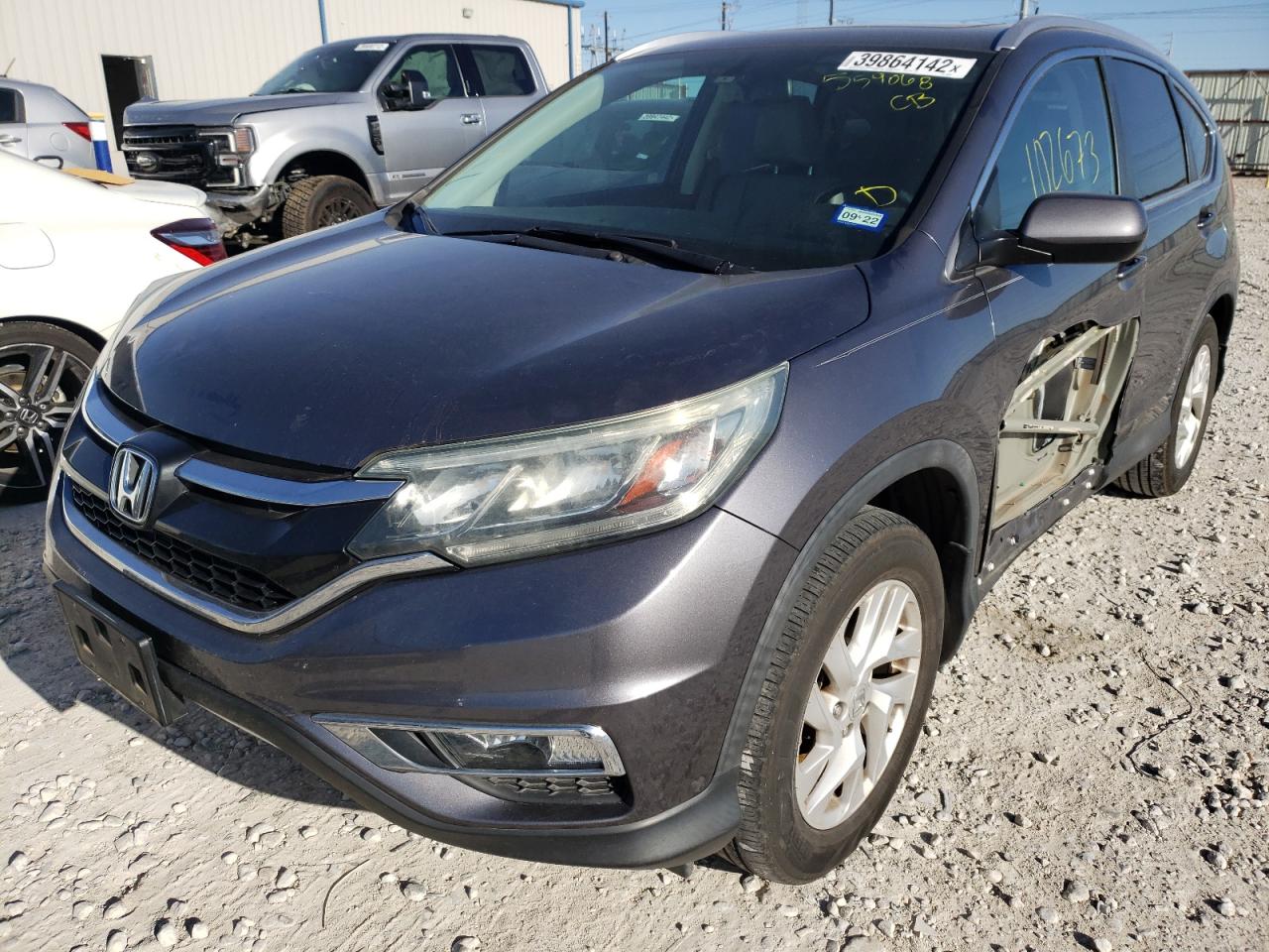 Photo 2 from auction – 2015 HONDA CR-V EXL with VIN 2HKRM3H77FH559068