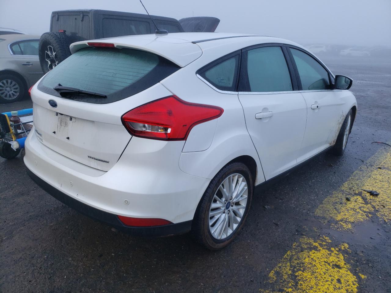 Photo 4 from auction – 2017 FORD FOCUS TITA with VIN 1FADP3N23HL333768