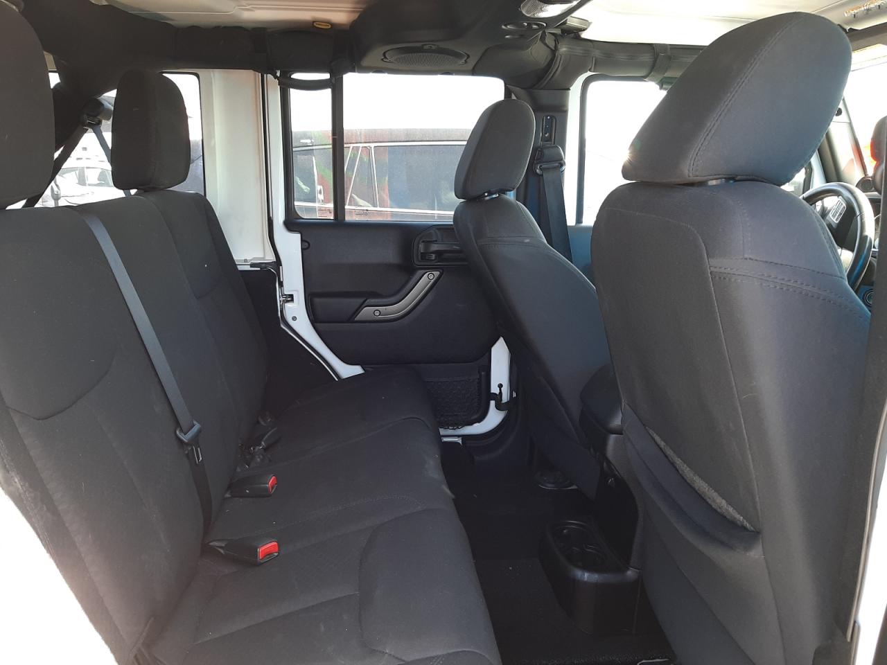 Foto 6 de la subasta – 2014 JEEP WRANGLER U con VIN 1C4BJWDG9EL251069