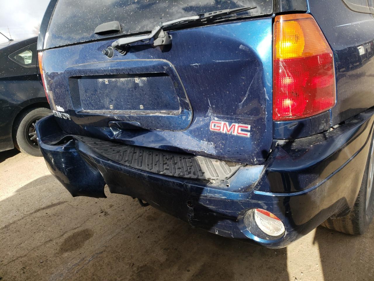 Photo 9 from auction – 2004 GMC ENVOY with VIN 1GKDT13SX42335213