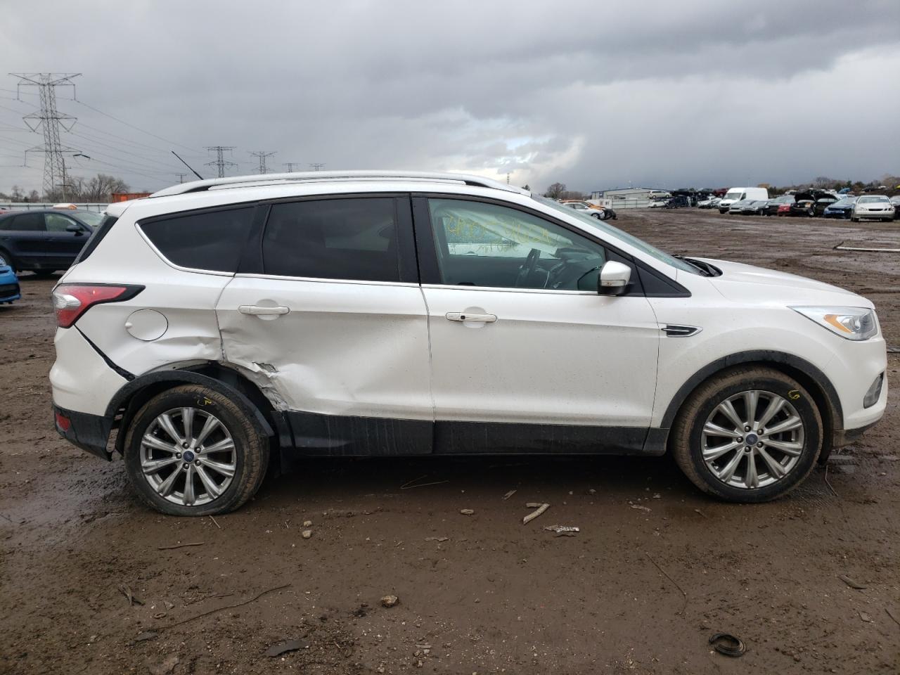 Photo 9 from auction – 2017 FORD ESCAPE TIT with VIN 1FMCU9JD1HUE82209