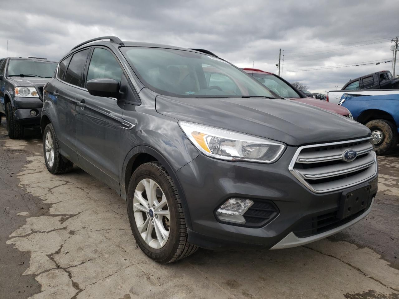 Photo 1 from auction – 2018 FORD ESCAPE SE with VIN 1FMCU9GD6JUA12447