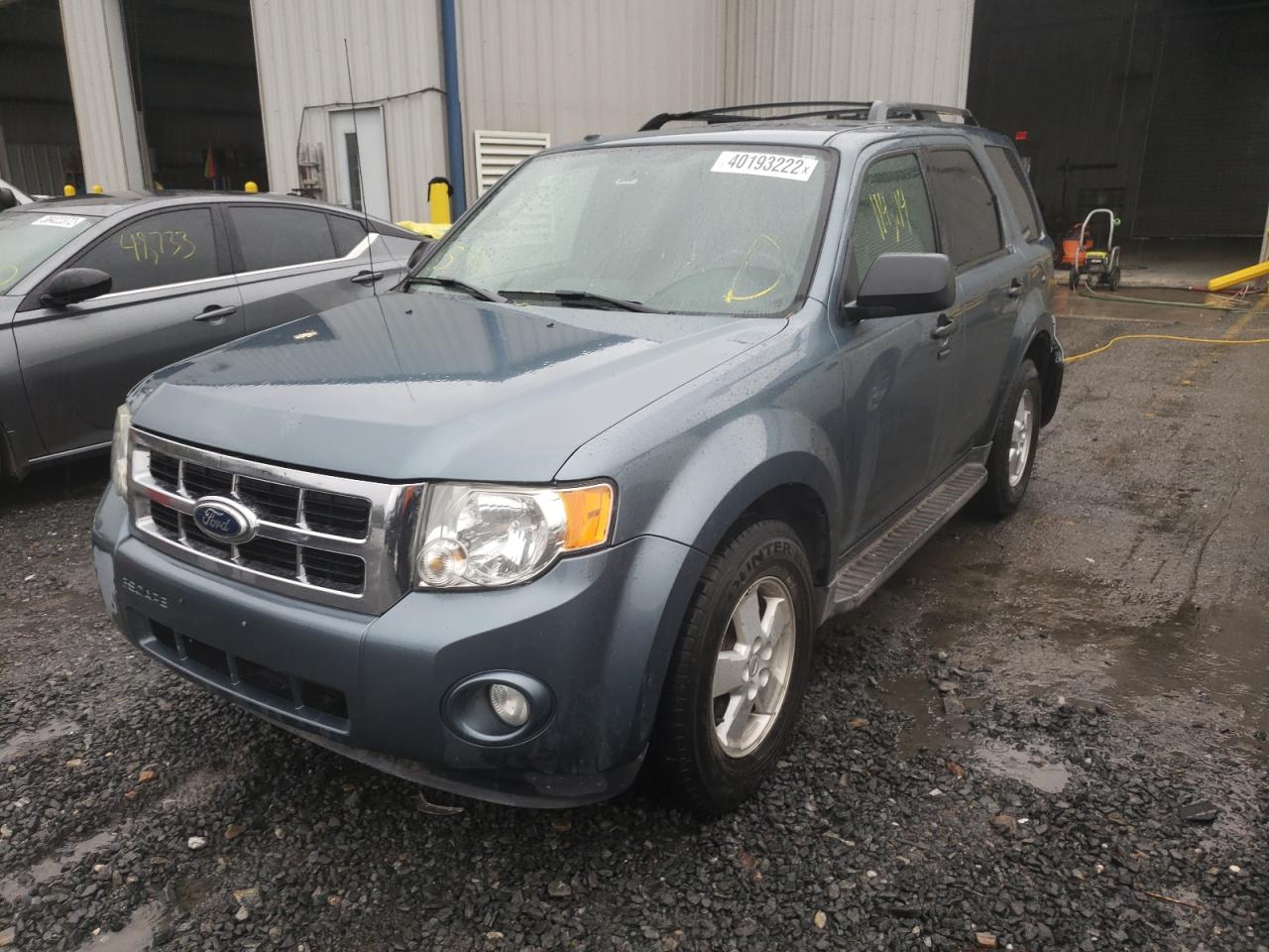 Photo 2 from auction – 2011 FORD ESCAPE XLT with VIN 1FMCU9D75BKA11771