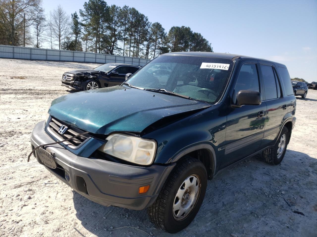 Photo 2 from auction – 1998 HONDA CR-V LX with VIN JHLRD2849WC017436