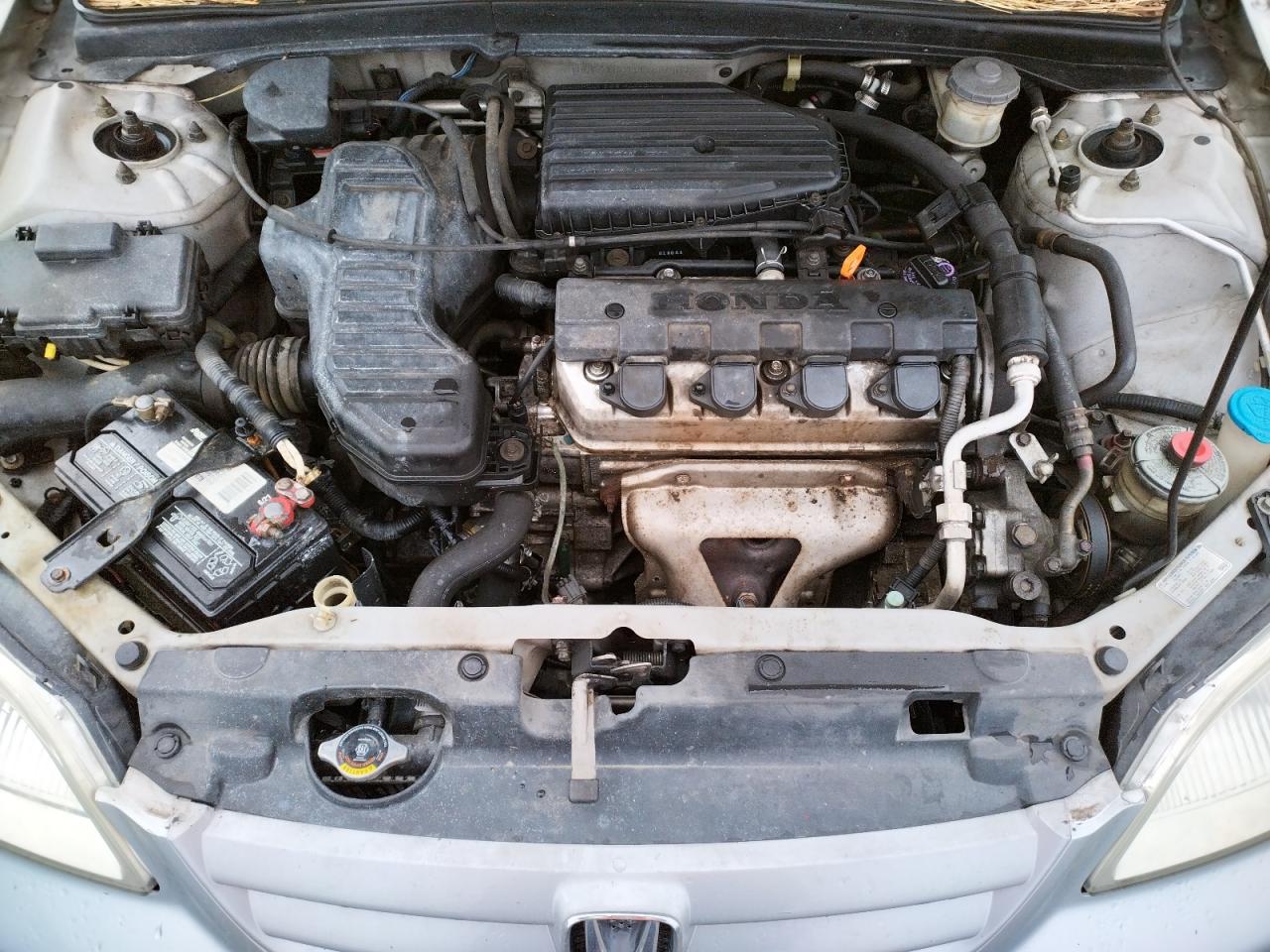Photo 7 from auction – 2002 HONDA CIVIC LX with VIN 1HGES16612L037367