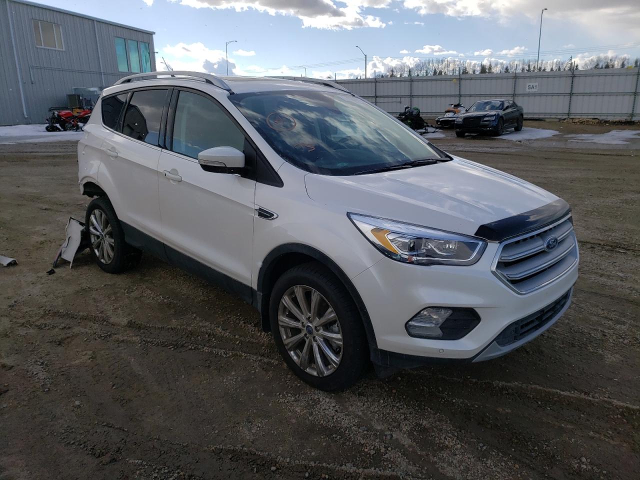 FORD ESCAPE TIT 2018 with VIN 1FMCU9J94JUB89048 - Photo from auction