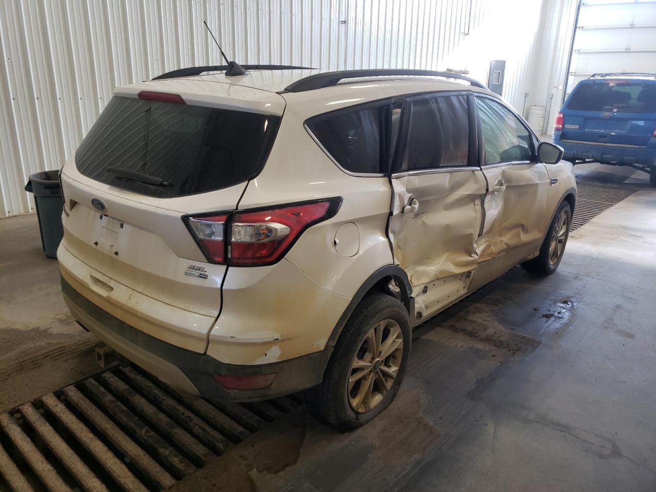 Photo 4 from auction – 2018 FORD ESCAPE SEL with VIN 1FMCU9HD2JUC82581