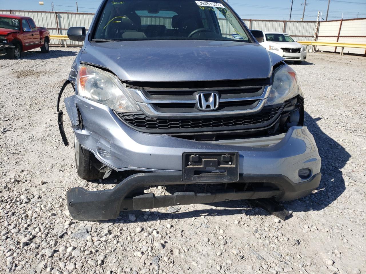 Photo 9 from auction – 2011 HONDA CR-V LX with VIN 5J6RE3H33BL056261