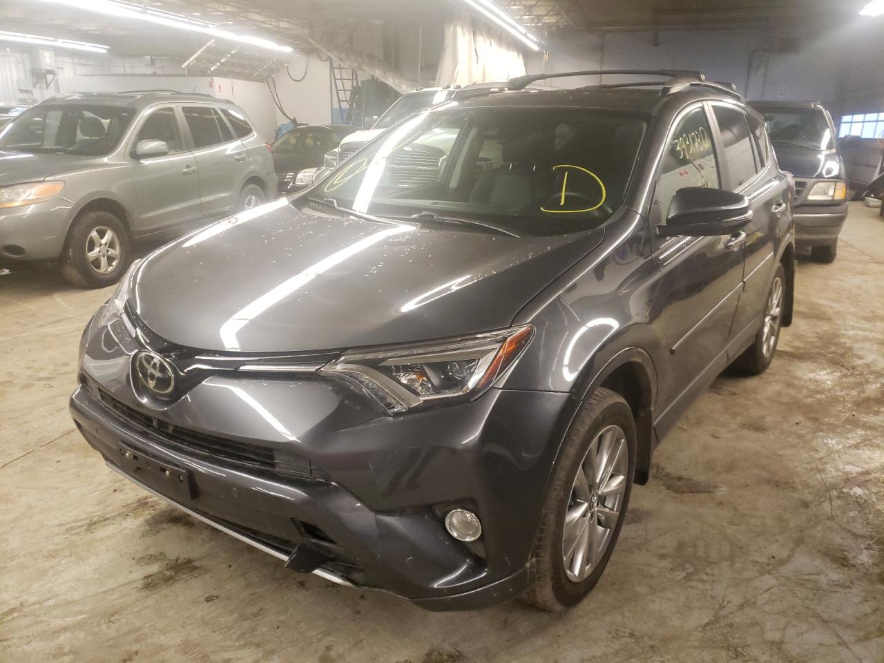 Photo 2 from auction – 2017 TOYOTA RAV4 LIMIT with VIN 2T3DFREV4HW564217