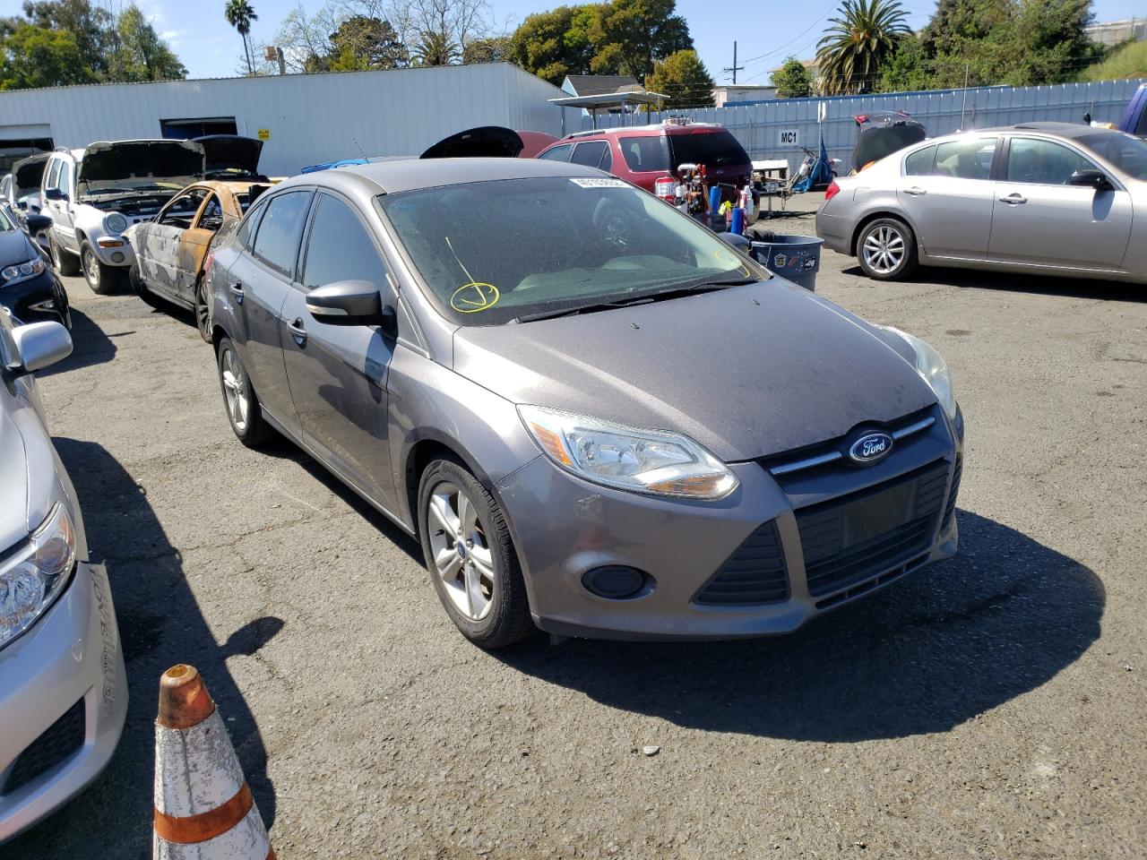 FORD FOCUS 2014 with VIN 1FADP3F22EL433189 - Photo from auction