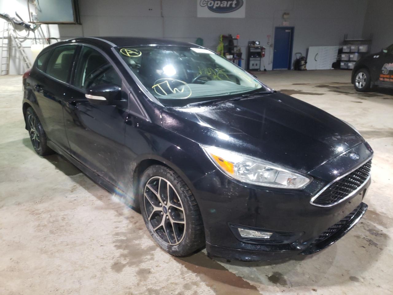 FORD FOCUS SE 2017 with VIN 1FADP3K27HL273515 - Photo from auction
