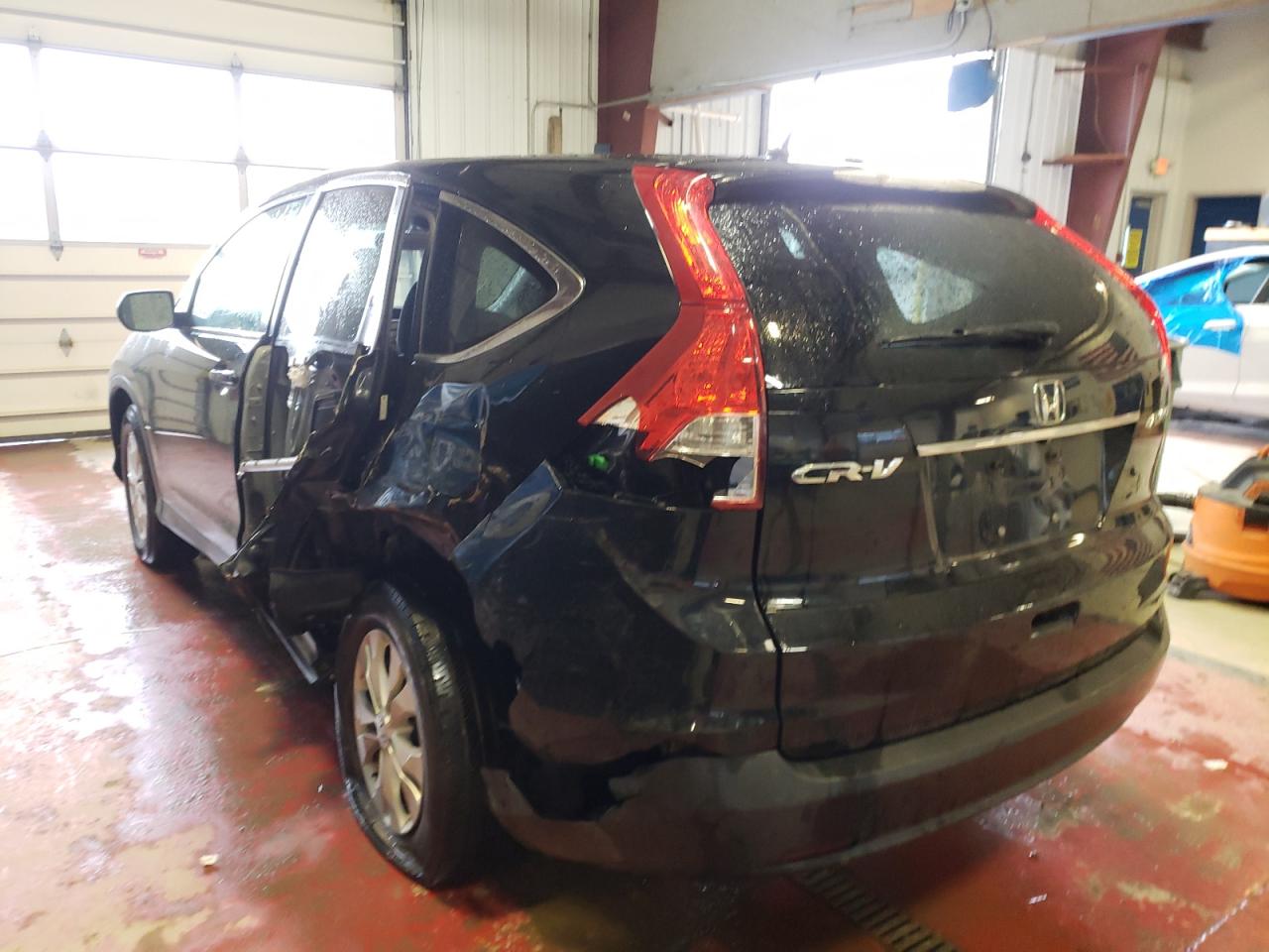 Photo 9 from auction – 2014 HONDA CR-V with VIN 5J6RM4H54EL086397