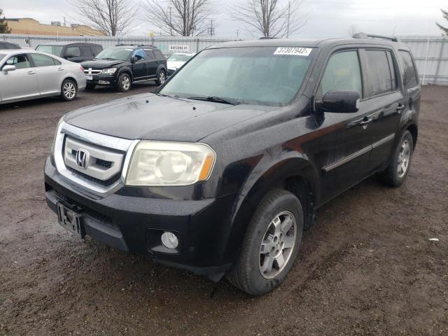 Фото 2 с аукциона – 2011 HONDA PILOT TOUR с VIN 5FNYF4H91BB502287