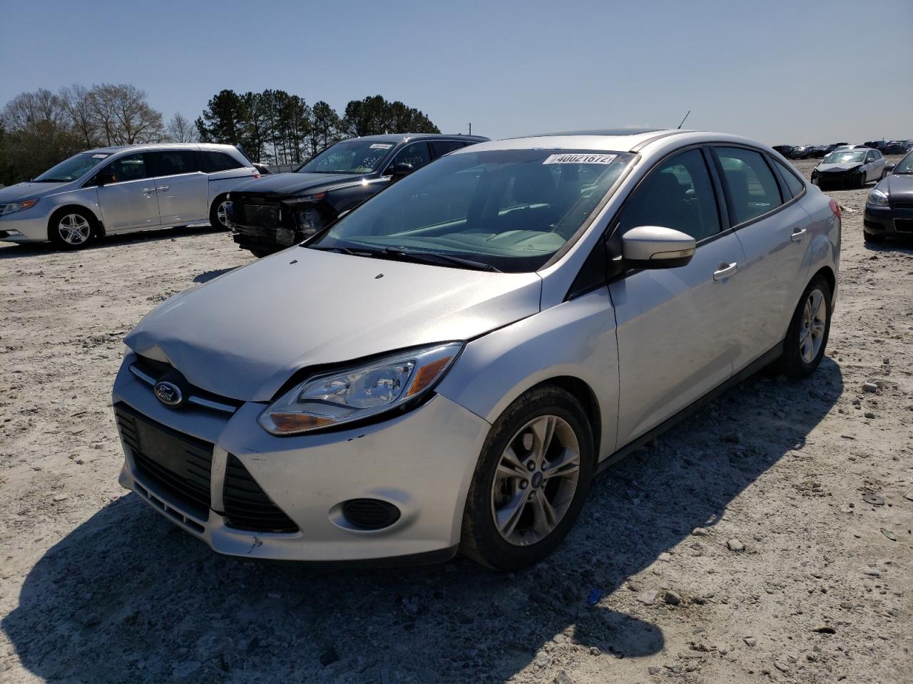 Photo 2 from auction – 2014 FORD FOCUS SE with VIN 1FADP3F27EL103127
