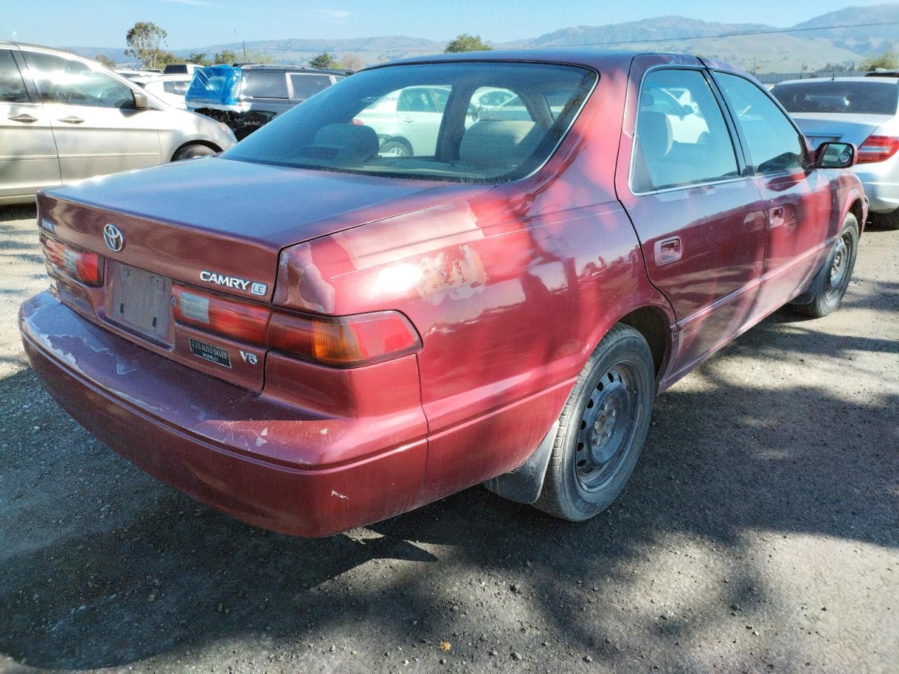Photo 4 from auction – 1997 TOYOTA CAMRY CE with VIN 4T1BF22KXVU028613