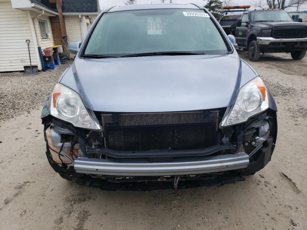 Photo 9 from auction – 2011 HONDA CR-V EXL with VIN 5J6RE4H73BL024256