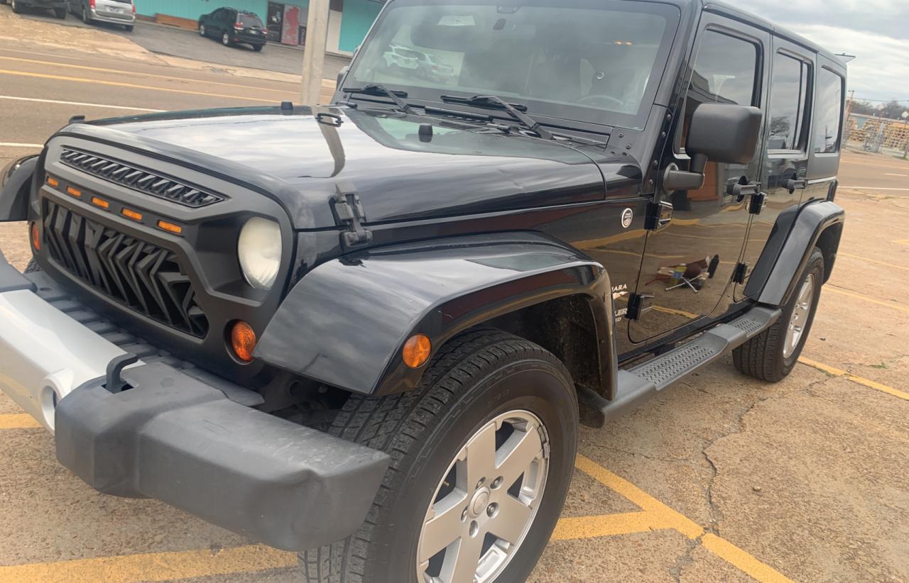 Photo 2 from auction – 2011 JEEP WRANGLER U with VIN 1J4BA5H19BL635956