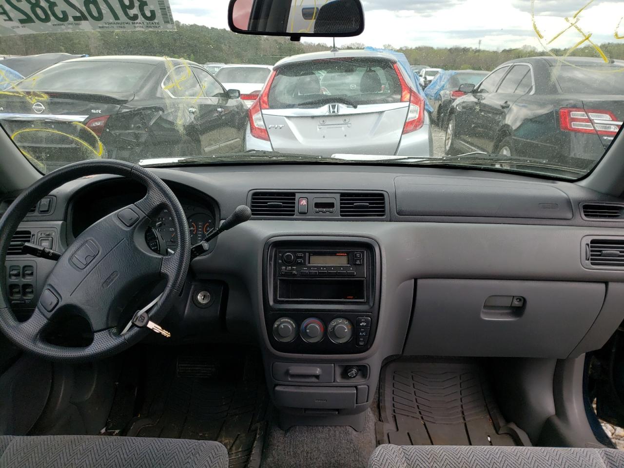 Photo 9 from auction – 1998 HONDA CR-V LX with VIN JHLRD1841WC083702