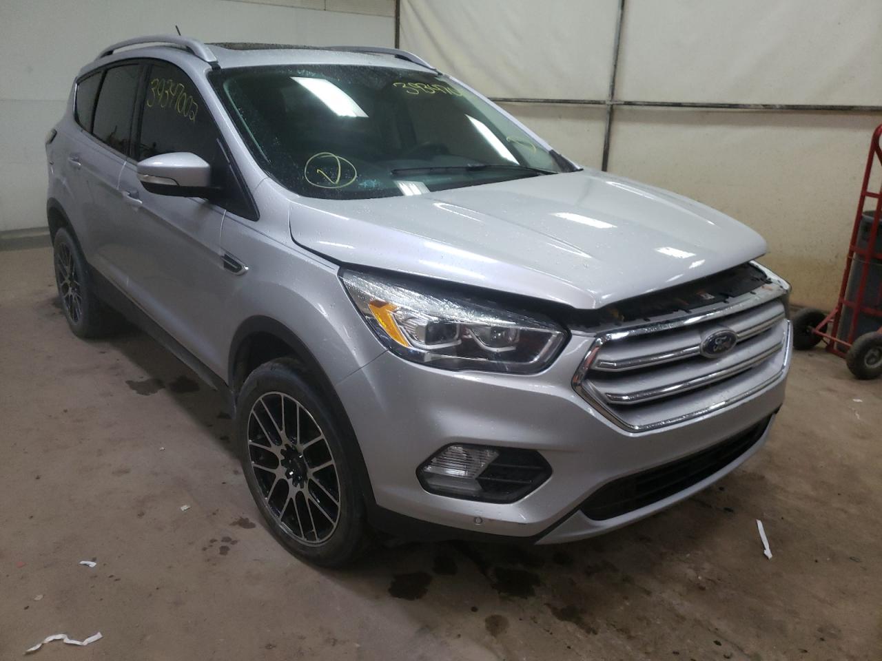 FORD ESCAPE TIT 2018 with VIN 1FMCU9J92JUA71080 - Photo from auction