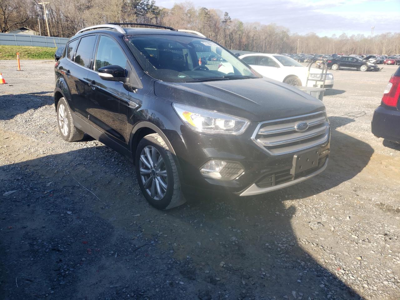 FORD ESCAPE TIT 2018 with VIN 1FMCU9J97JUC53499 - Photo from auction