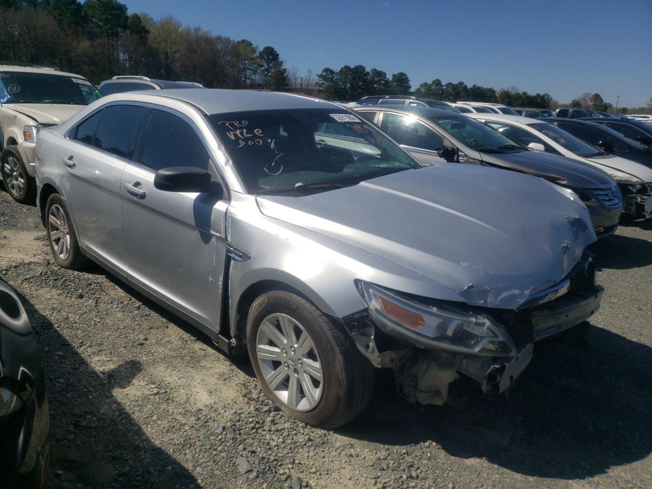 FORD TAURUS SE 2012 with VIN 1FAHP2DW3CG109790 - Photo from auction
