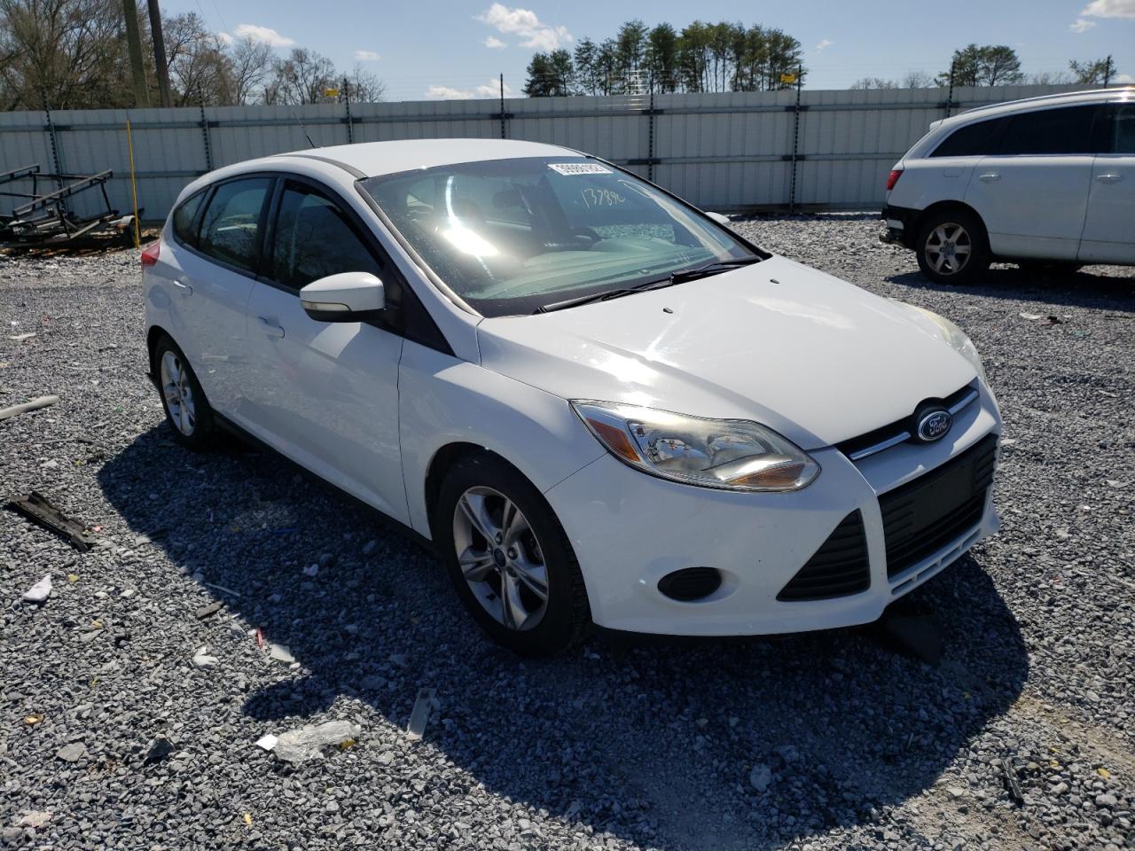 FORD FOCUS SE 2014 with VIN 1FADP3K29EL165599 - Photo from auction